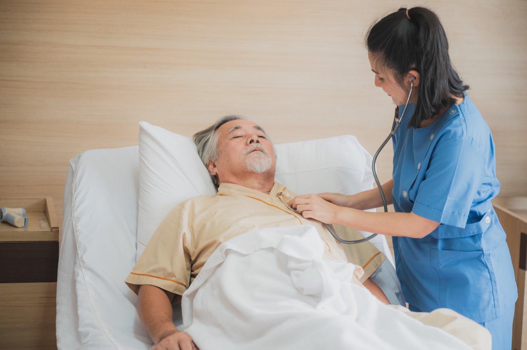 nursing-home-care-concept-the-healthy-nurse-helping-support-and-checking-the-elderly-male.jpg