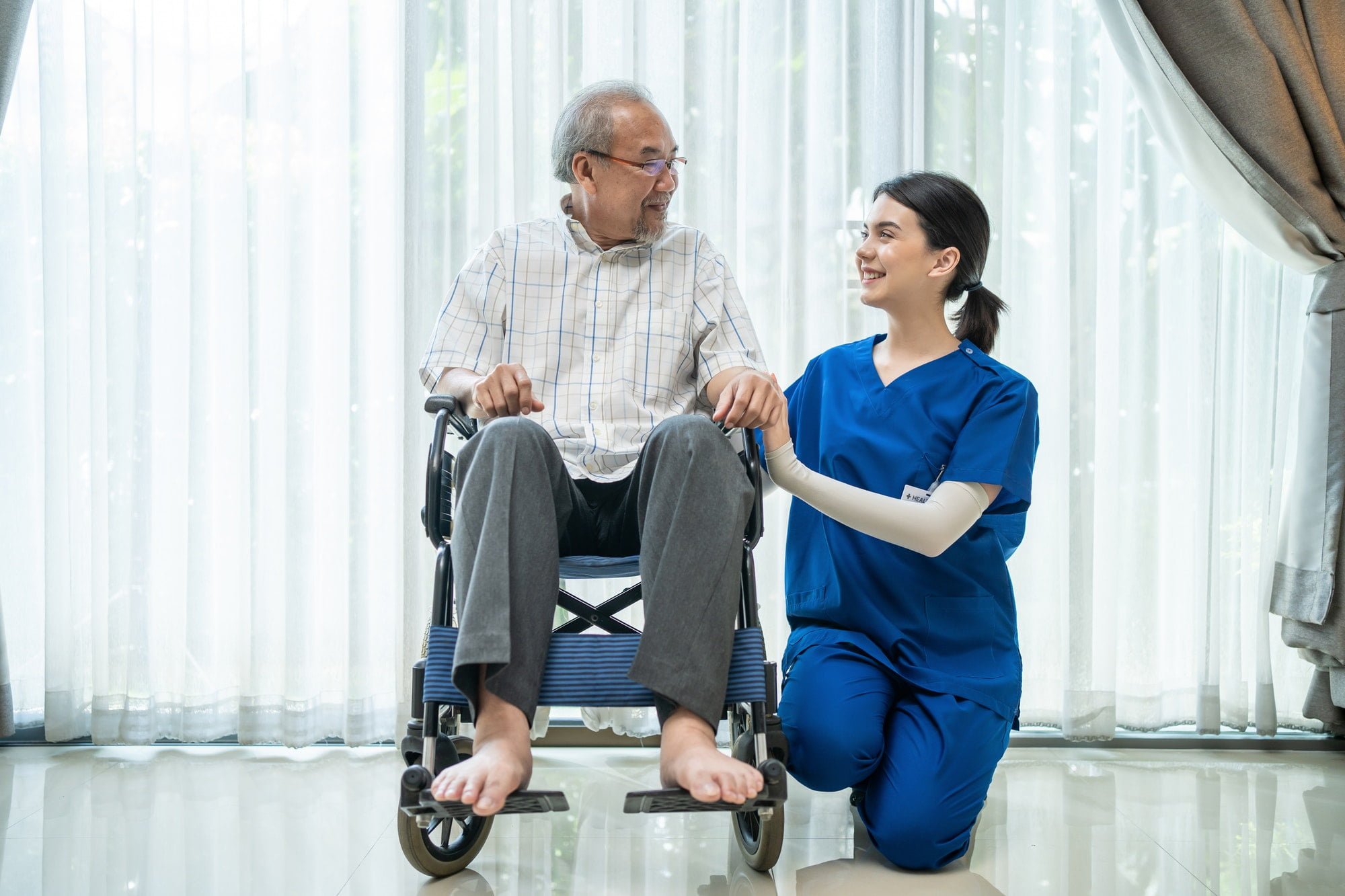 portrait-of-happy-asian-disabled-senior-elderly-male-on-wheelchair-enjoy-stay-home-nursing-care-.jpg